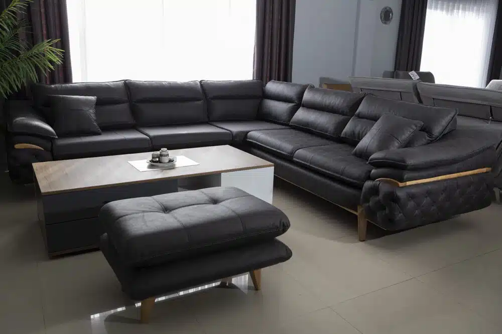 Ecksofa Maja Black 300x300cm mit Hocker