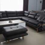 Ecksofa Maja Black 300x300cm mit Hocker